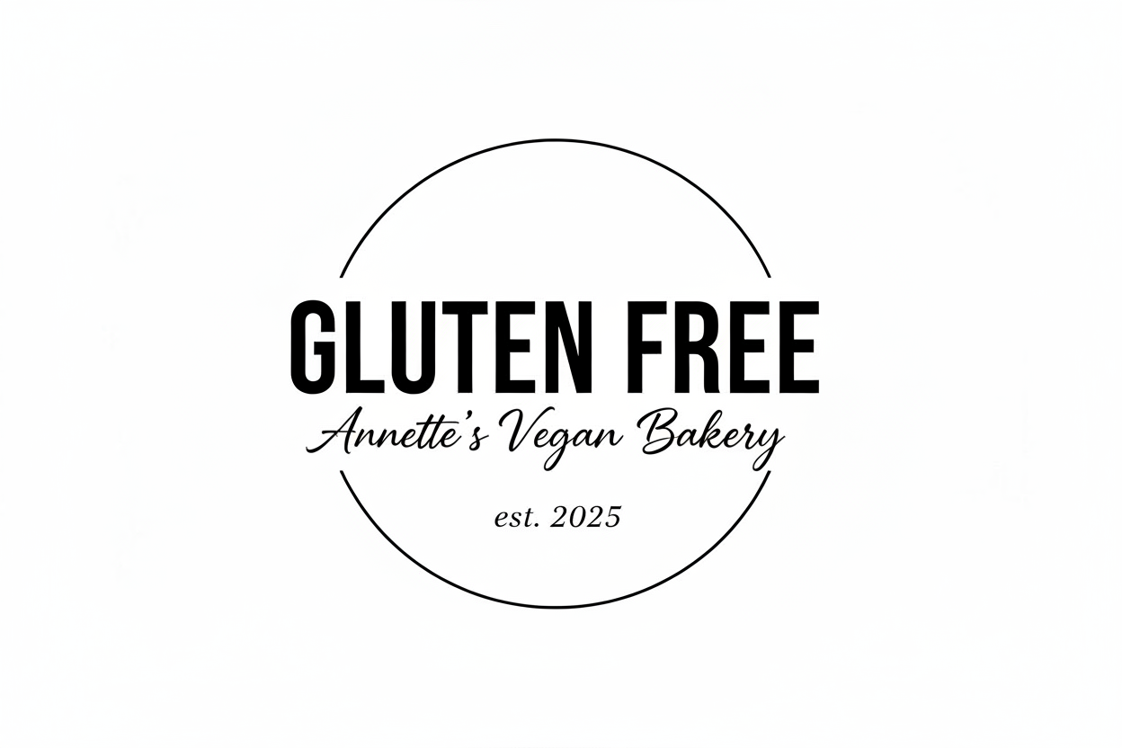 Minimal black-and-white circular logo with the words ‘GLUTEN FREE’ in bold uppercase letters at the center. Below it, ‘Annette’s Vegan Bakery’ appears in a cursive script, and ‘est. 2025’ is written in small text at the bottom within the circle.
